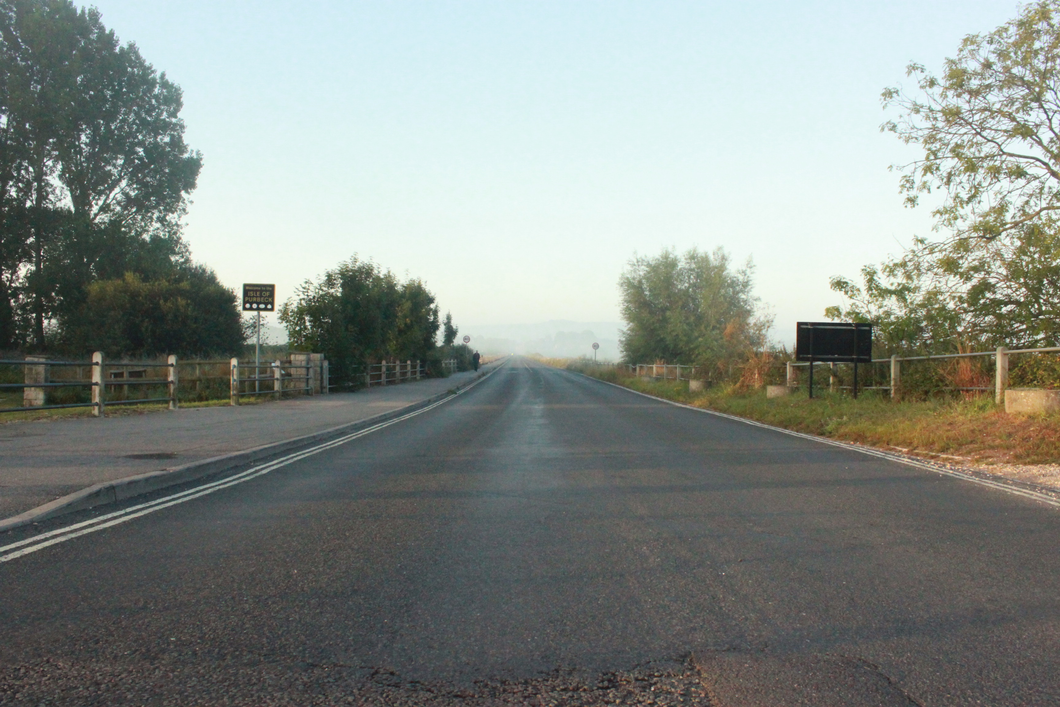 an image of a misty road.